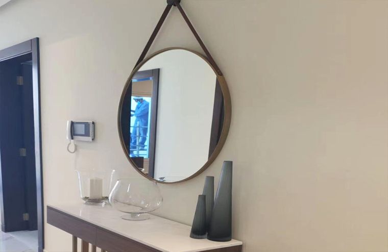 metal framed hanging mirror